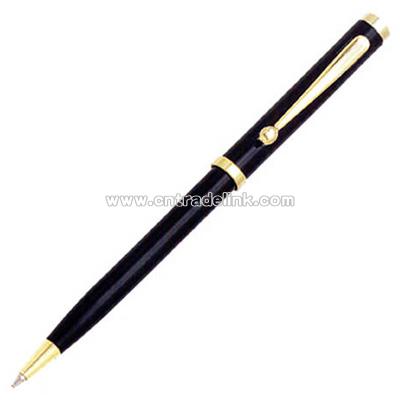 Black brass push action pen with flat top cap and gold trim