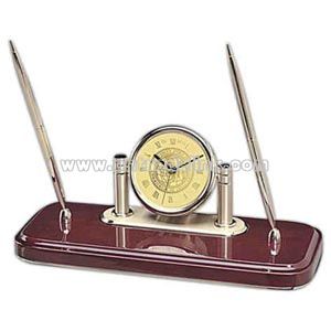 Brass clock with rosewood base