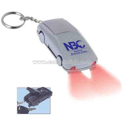 Car shape key holder/light with tailpipe whistle