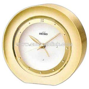 Clock with gold tone metal case