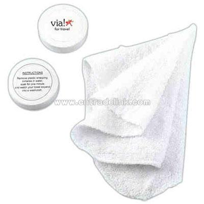Compressed hand towel or face cloth