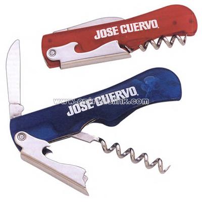 Corkscrew with bottle opener and serrated knife
