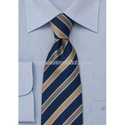 Dark blue striped silk tie Striped tie in midnight blue, with tan and bronze stripes