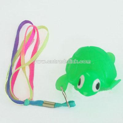 Flashing Tortoise toy with cord