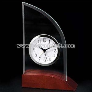 Glass alarm clock on wood base