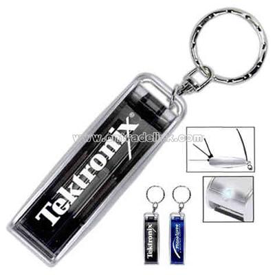 Key chain with light and three small fold-out screwdrivers