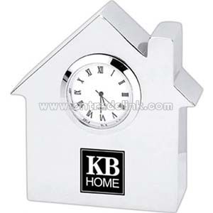 Metal house shaped paperweight clock