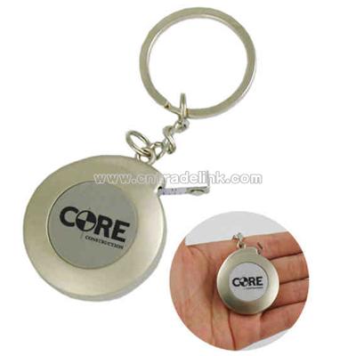 Metal key tag with tape measure