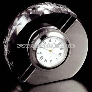 Oval crystal and metal clock