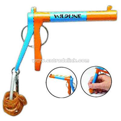 Rubber band shooter with twist out pen tip.