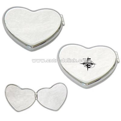 Silver plated brass compact with magnifying mirror
