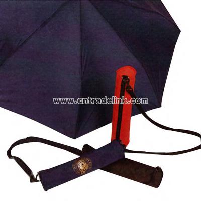 Small folding umbrella with color coordinated handle
