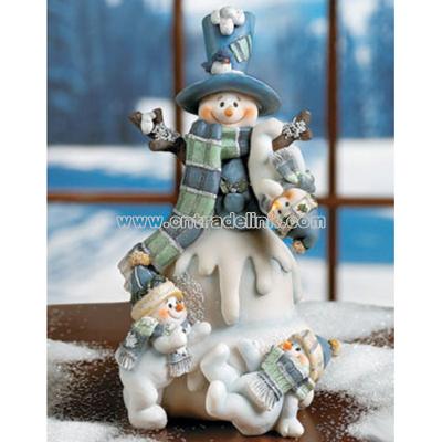 Snowman With Three Snow Kids