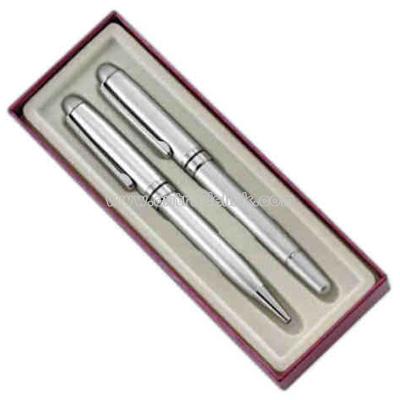 Stylish silver ballpoint and rollerball pen in cardboard box