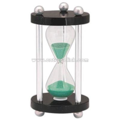 Black hi-tech sand timer with green sand