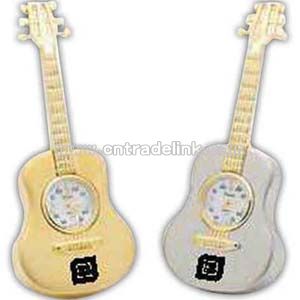 Brass acoustic guitar with clock