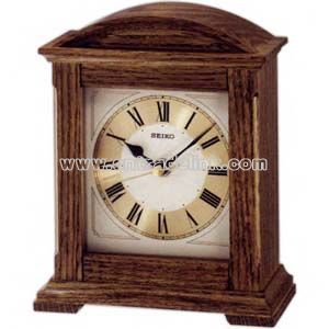 Clock with brown oak case