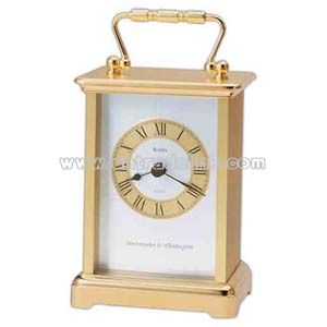 Clock with goldtone case