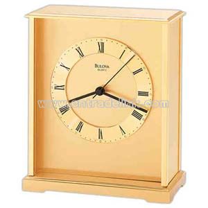 Clock with solid brass case