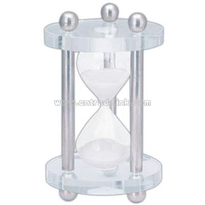 Contemporary acrylic sand time with aluminum columns.