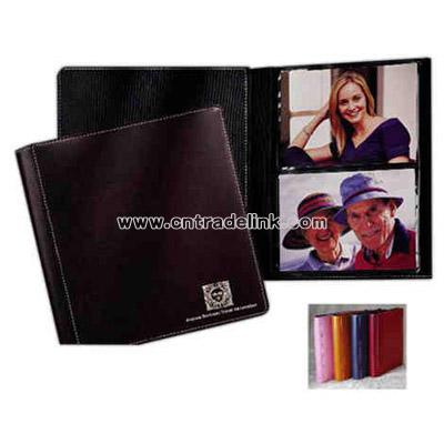 Cowhide photo portfolio with silver contrast stitching