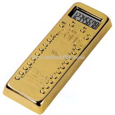Eight digit calculator and paper weight in the shape of gold bar