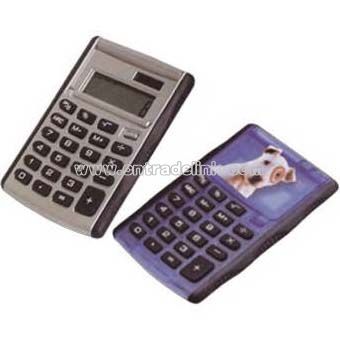 Eight digit flipper calculator with rubber grid and raised soft rubber key