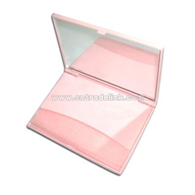 Facial oil blotting paper in plastic case with mirror