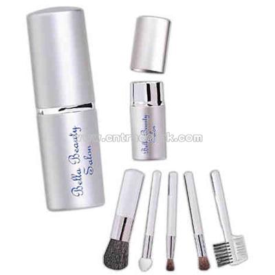 Five piece cosmetic brush set in aluminum case