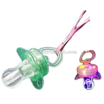 Flashing whistle pacifier