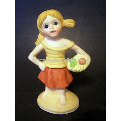 Girl Holding Basket? Porcelain Figurine