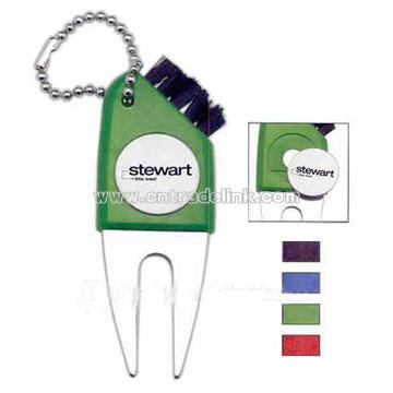 Golf tool that includes divot repair tool & ball marker