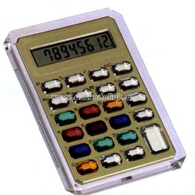 Hand held calculator with jeweled buttons
