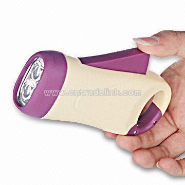 Hand pressing Flashlight