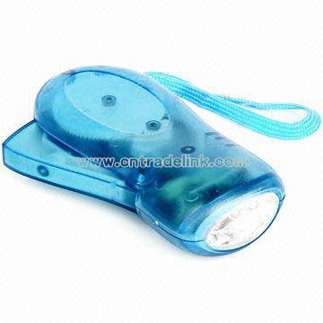 Hand pressing Flashlight