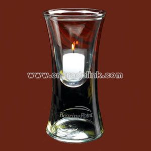 Hanging votive holder hangs inside a 9