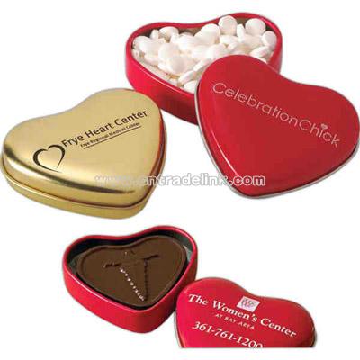 Heart shape tin filled with molded chocolate