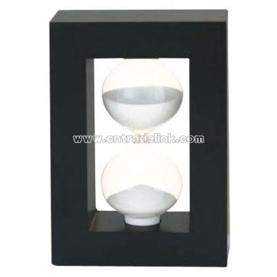 High tech round hour glass timer in rectangular frame