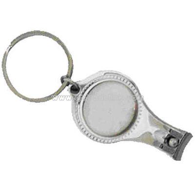 Key chain with nail clipper and bottle opener