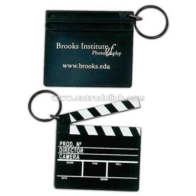 Key holder with plastic clapboard replica