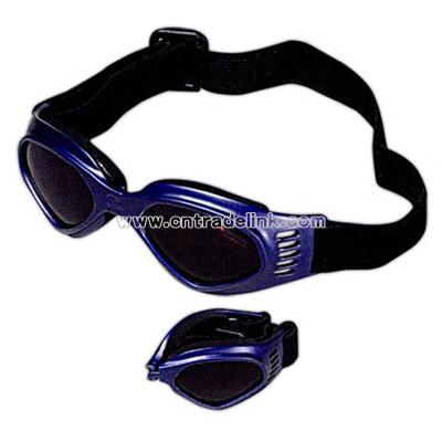 Kid's foldable frame goggles with adjustable head strap.