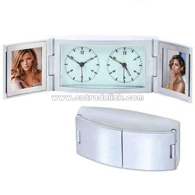 Matte silver dual time alarm clock with glow in the dark dial and double frame.
