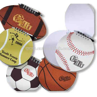 Memo pad with retractable pen