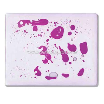 Mouse pad filled with clear and purple liquid