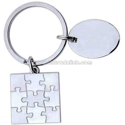 Nickel finished puzzle shape designer key tag with 1