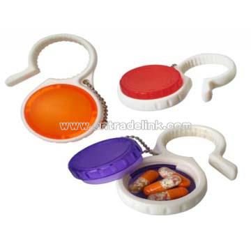 Pill box with bottle opener