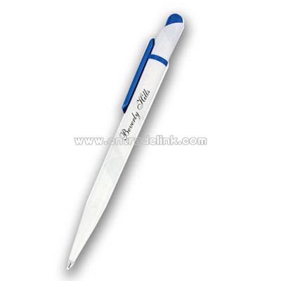 Plastic ballpoint pen with a colored clip and top