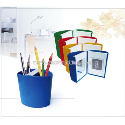 Plastic pen holder with photo frame