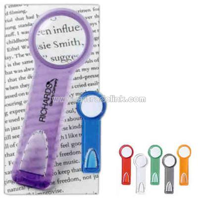 Plastic ruler / bookmark with magnifying glass