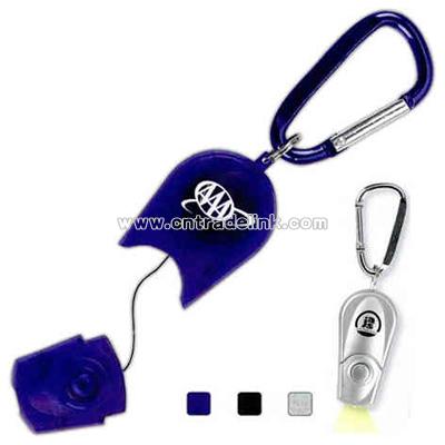 Retractable light with carabiner clip